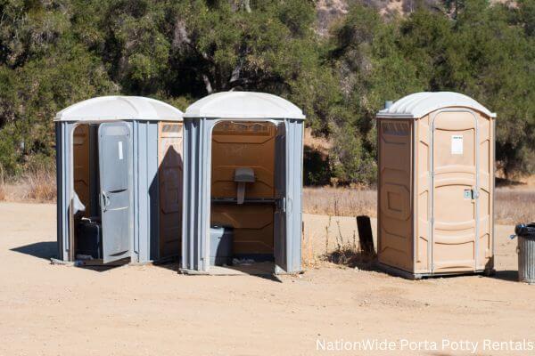 a clean row of portable restrooms for outdoor weddings or festivals in Pine Hill, AL